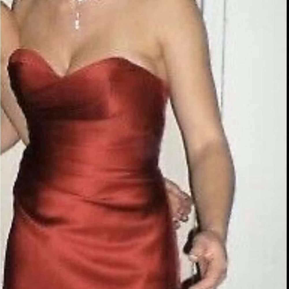 Size 2 gorgeous new condition red gown. Wore once (smoke and pet free)